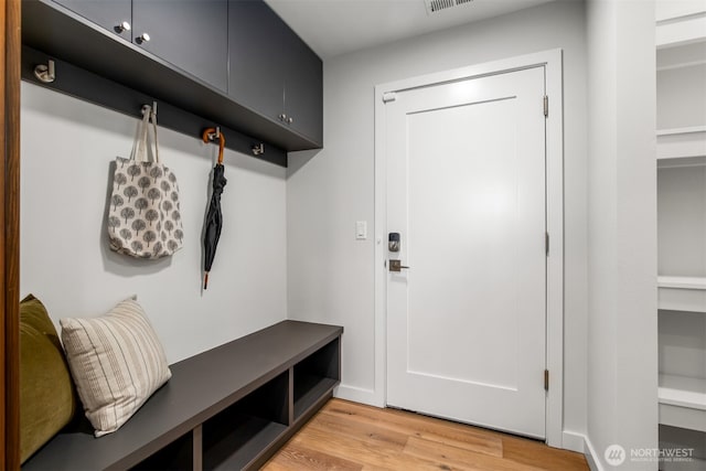 mudroom with visible vents and light wood-style flooring