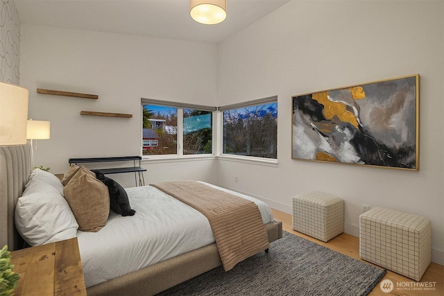 bedroom featuring wood finished floors