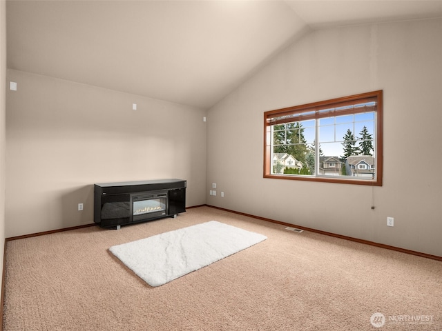 bonus room featuring vaulted ceiling, carpet floors, visible vents, and baseboards