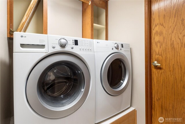 6612 NE Pear St, Suquamish, WA 98392 - clothes washing area featuring laundry area and washer and clothes dryer