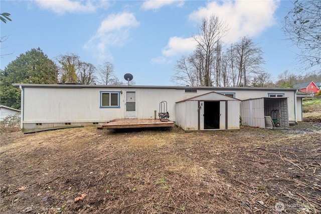 6612 NE Pear St, Suquamish, WA 98392 - back of house featuring crawl space, a shed, and an outdoor structure