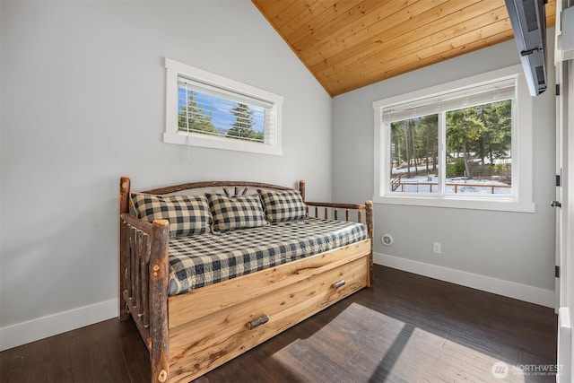 bedroom with vaulted ceiling, dark wood-style floors, baseboards, and wooden ceiling