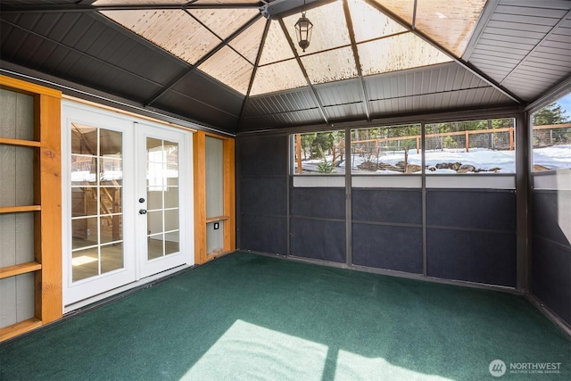 unfurnished sunroom featuring french doors and lofted ceiling