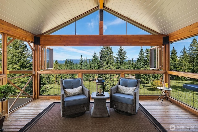 sunroom with vaulted ceiling