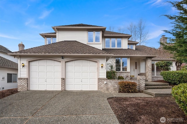 prairie-style house featuring driveway, an attached garage, and brick siding