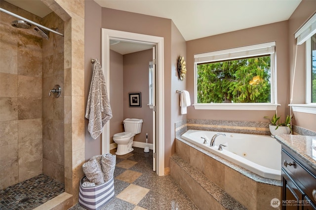 full bath with a stall shower, baseboards, toilet, vanity, and a bath