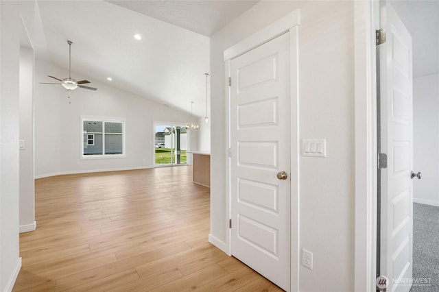 1138 8th Ave NE, Ephrata, WA 98823 - hall with light wood-style floors, baseboards, vaulted ceiling, and recessed lighting