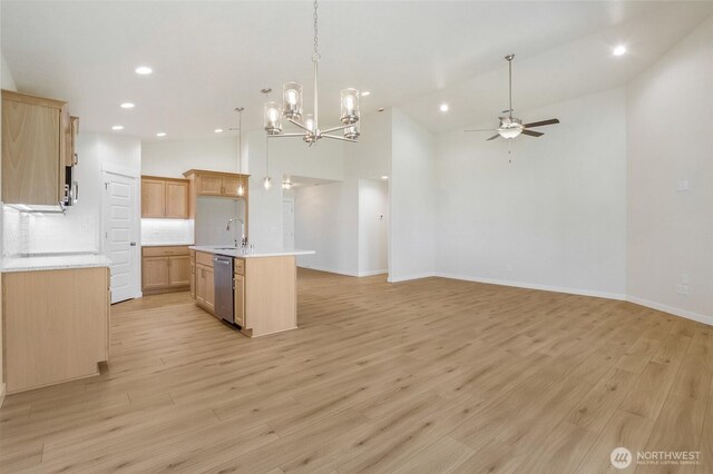 1138 8th Ave NE, Ephrata, WA 98823 - kitchen featuring light countertops, ceiling fan with notable chandelier, recessed lighting, open floor plan, and stainless steel dishwasher