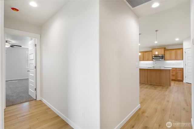 1138 8th Ave NE, Ephrata, WA 98823 - hall featuring recessed lighting, baseboards, visible vents, and light wood finished floors