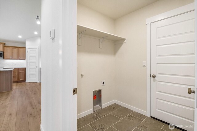 1138 8th Ave NE, Ephrata, WA 98823 - washroom with laundry area, recessed lighting, baseboards, hookup for an electric dryer, and visible vents