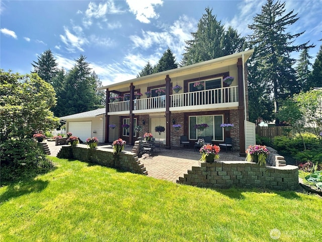 2931 Westwood St NW, Olympia, WA 98502 - rear view of house featuring a balcony and a garage