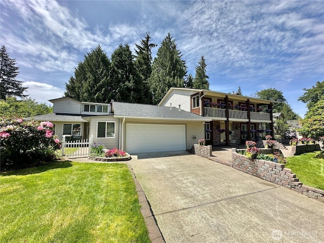 2931 Westwood St NW, Olympia, WA 98502 - view of front of property featuring an attached garage, a balcony, concrete driveway, and roof with shingles