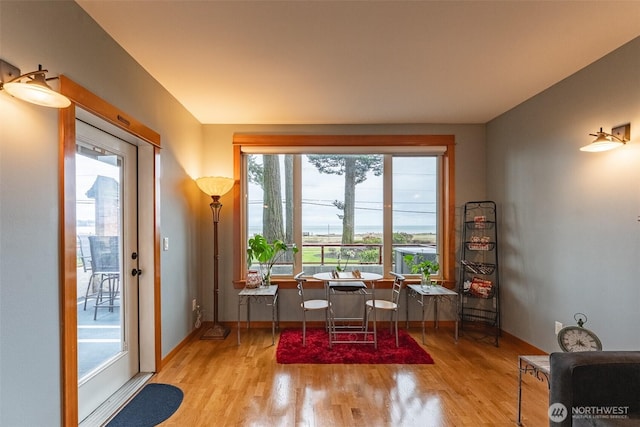 interior space with light wood-style flooring and baseboards