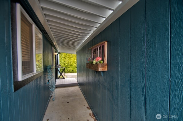 view of side of property with a porch