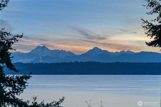 mountain view with a water view