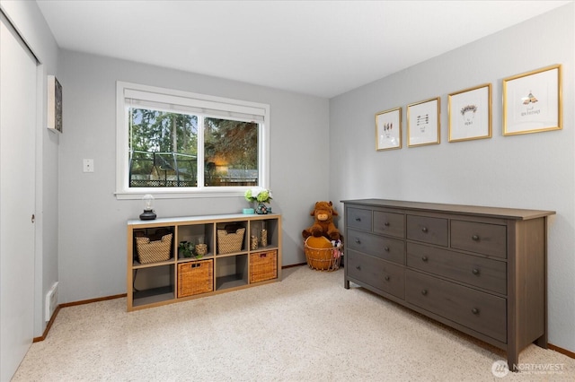 rec room featuring light carpet, visible vents, and baseboards