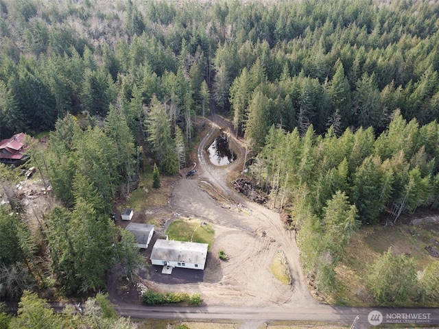 bird's eye view with a forest view