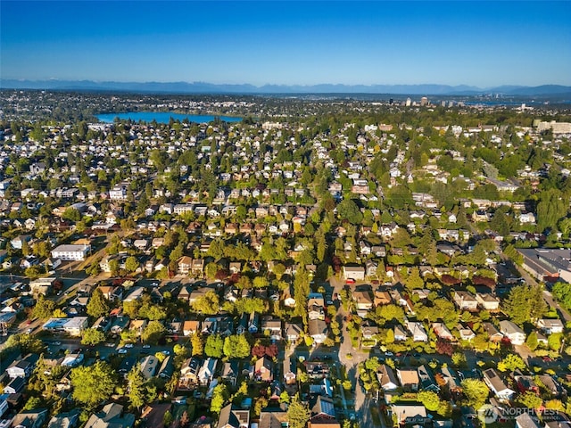 aerial view with a residential view and a water and mountain view