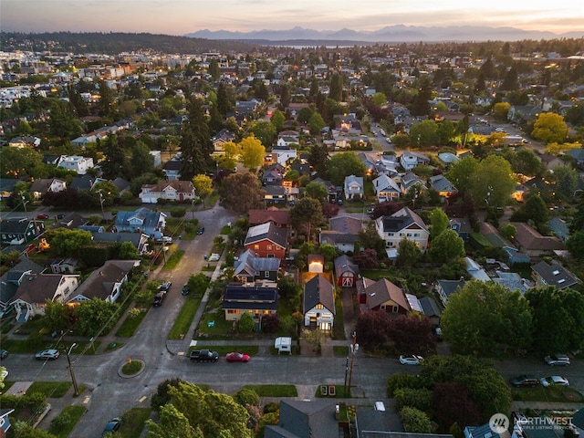 birds eye view of property with a residential view