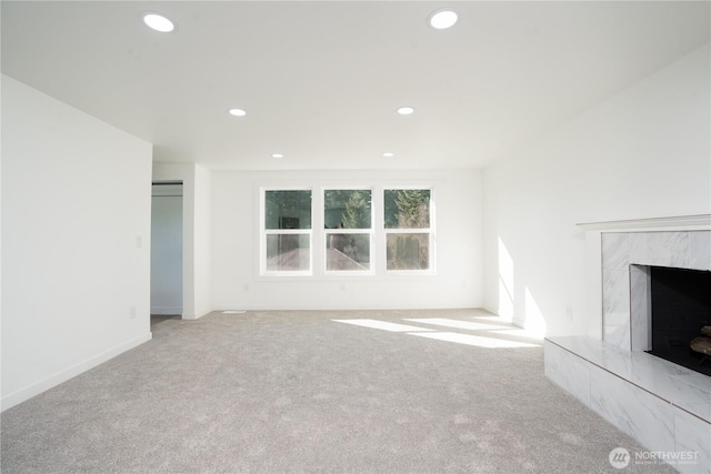 6201 53rd Street Ct W, University Place, WA 98467 - unfurnished living room featuring carpet flooring, recessed lighting, a fireplace, and baseboards