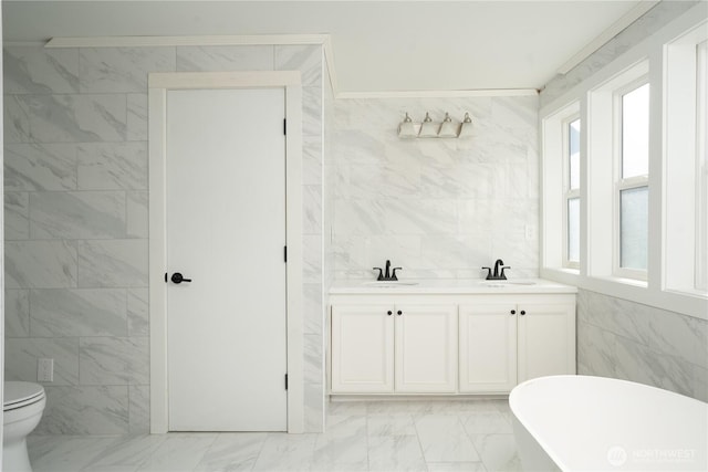 6201 53rd Street Ct W, University Place, WA 98467 - bathroom featuring toilet, marble finish floor, a sink, tile walls, and a soaking tub