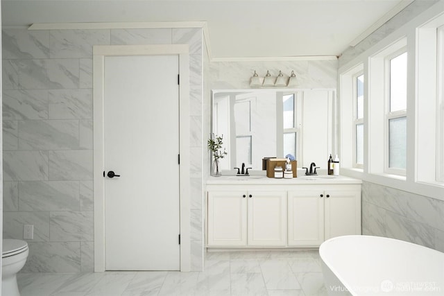 6201 53rd Street Ct W, University Place, WA 98467 - bathroom with a soaking tub, double vanity, ornamental molding, tile walls, and marble finish floor