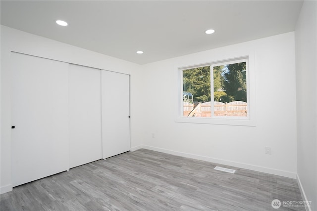 6201 53rd Street Ct W, University Place, WA 98467 - unfurnished bedroom with visible vents, recessed lighting, baseboards, and wood finished floors