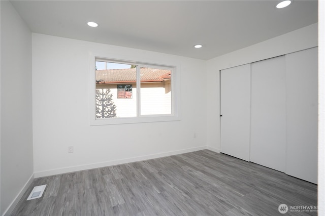 6201 53rd Street Ct W, University Place, WA 98467 - unfurnished bedroom featuring recessed lighting, visible vents, and wood finished floors