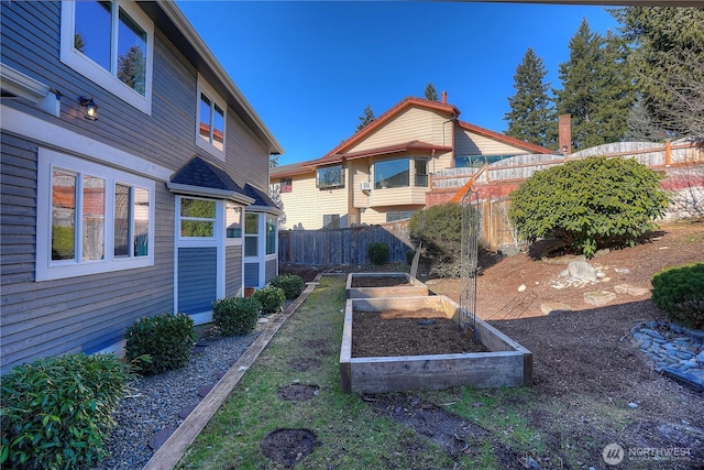 6201 53rd Street Ct W, University Place, WA 98467 - view of yard with a vegetable garden and fence