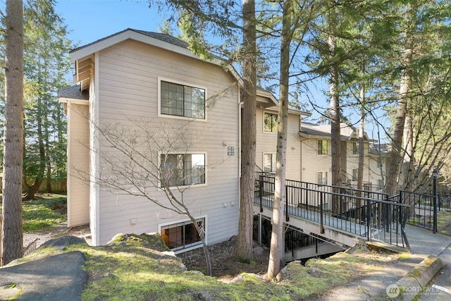 rear view of house with a deck