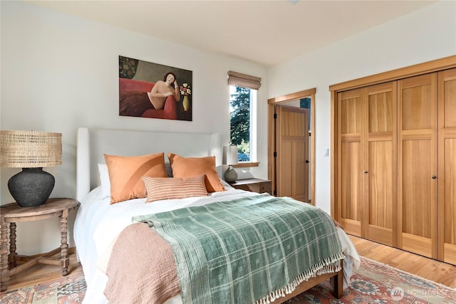 bedroom with wood finished floors