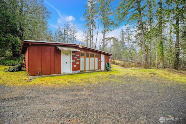 view of outbuilding with an outbuilding