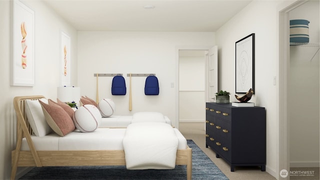 bedroom with carpet floors and baseboards