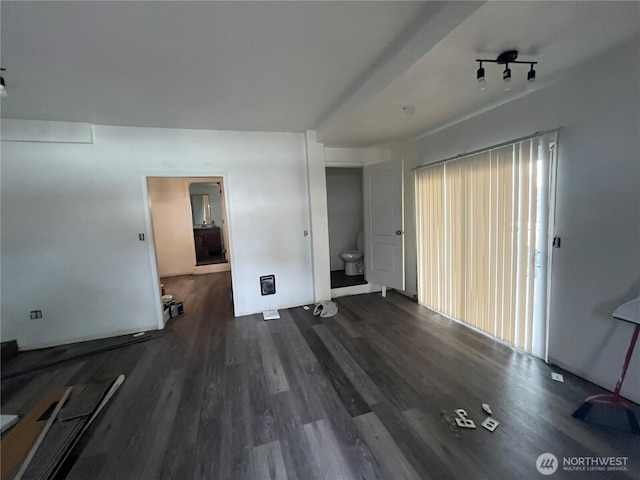 interior space with dark wood-type flooring