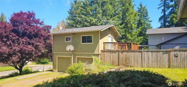 13837 Horsefall Ave SE, Rainier, WA 98576 - view of home's exterior with a garage