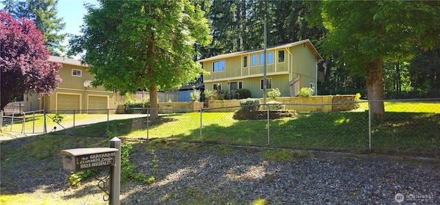 13837 Horsefall Ave SE, Rainier, WA 98576 - view of yard featuring an attached garage