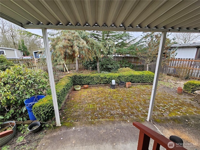 view of yard featuring a patio and a fenced backyard