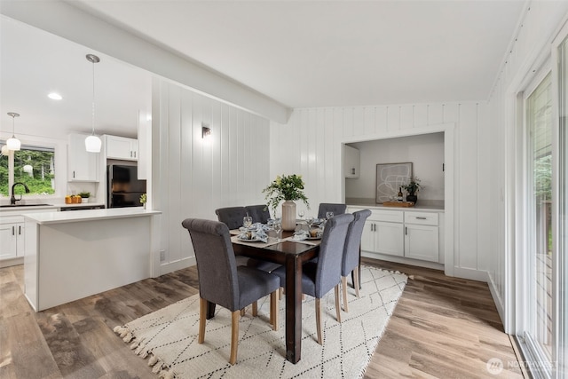 dining room featuring light wood finished floors