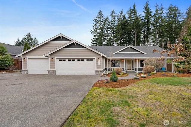 ranch-style house featuring a porch, concrete driveway, a front yard, a garage, and brick siding