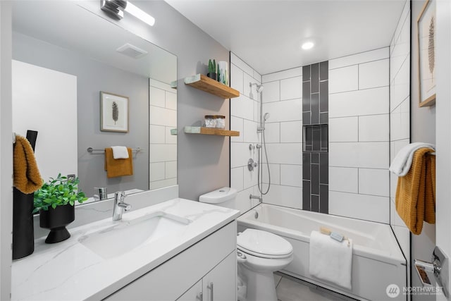 bathroom with visible vents, vanity, toilet, and shower / bathtub combination