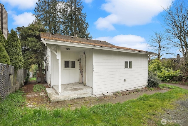 garage featuring fence