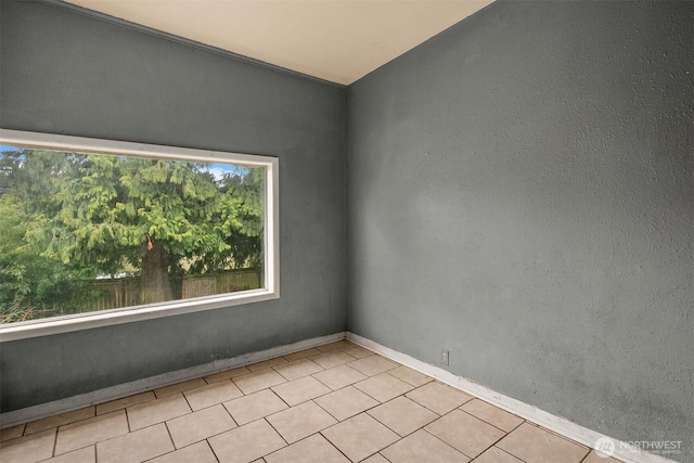 view of tiled spare room