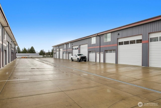 view of street with community garages