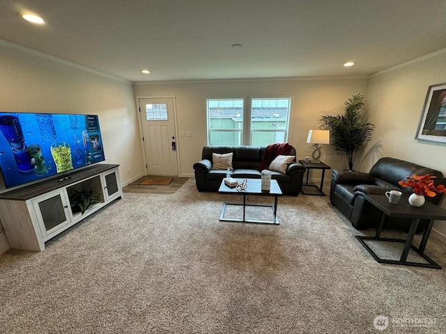 carpeted living room featuring baseboards, ornamental molding, and recessed lighting