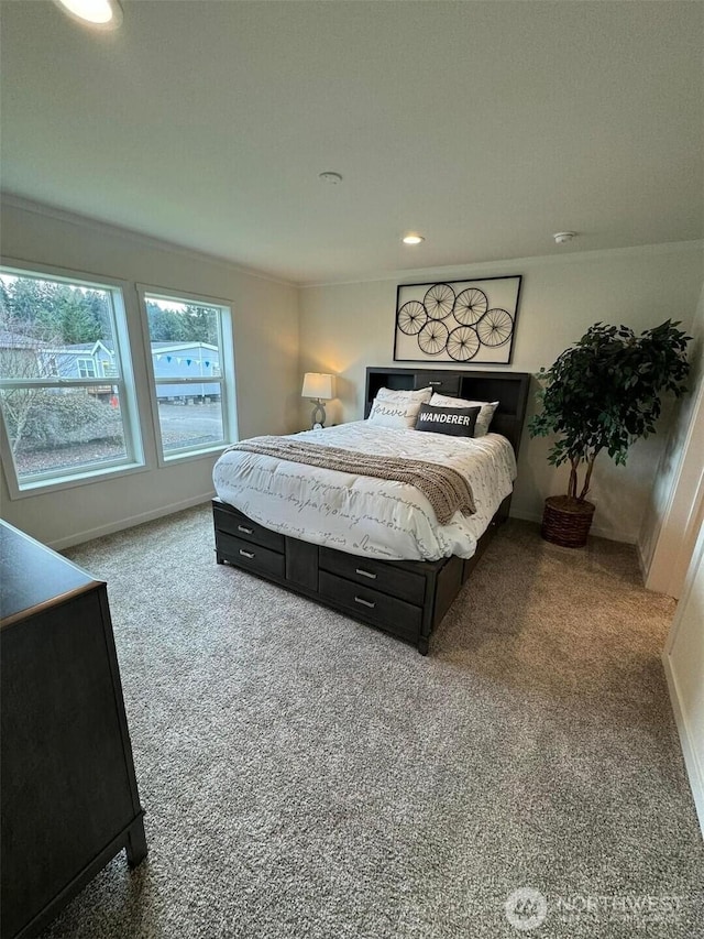 carpeted bedroom with ornamental molding, recessed lighting, and baseboards