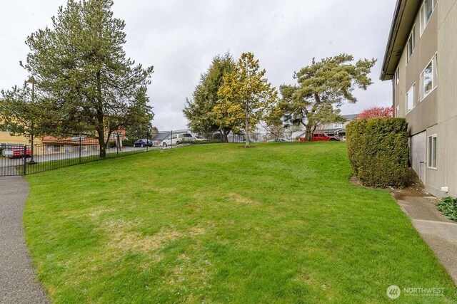 view of yard featuring fence