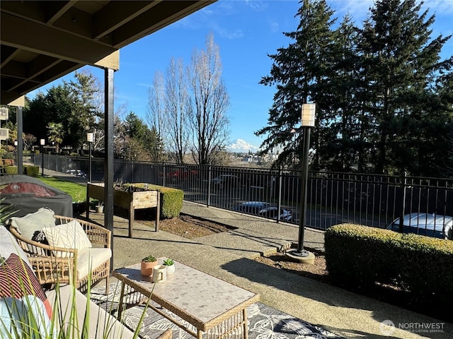 exterior space featuring a patio area and fence