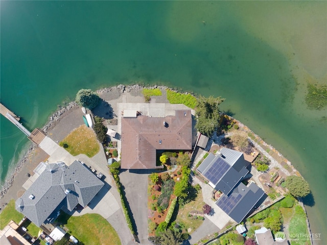 bird's eye view with a water view