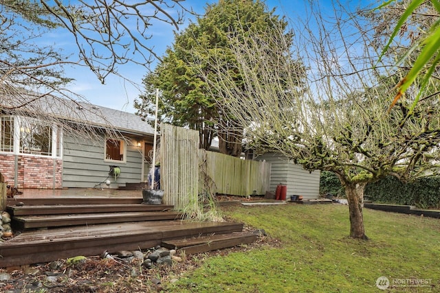 view of yard featuring fence