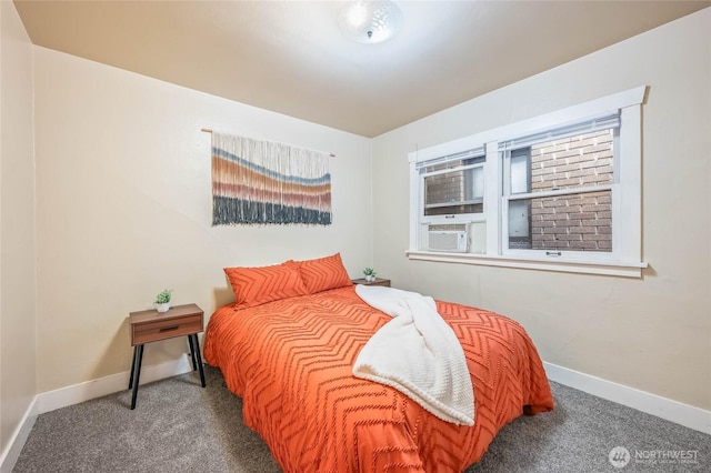 carpeted bedroom with baseboards